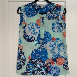 sleeveless half button neck blouse